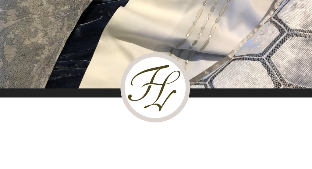 A selection of fabrics with the Fino Lino logo
