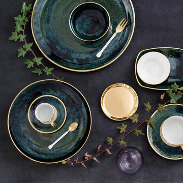 Lush Forest Pasta Dish shown from above with coordinating dinnerware and a strand of ivy