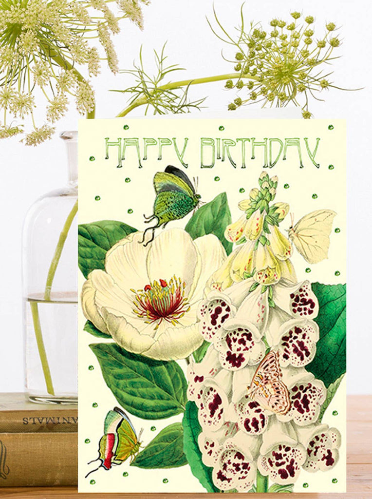 Birthday card with floral design and butterflies on a white background and the text "Happy Birthday"