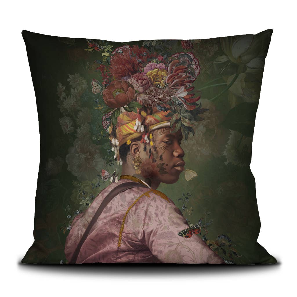 Decorative pillow with a stylized portrait of a man wearing a floral headpiece on a dark background.