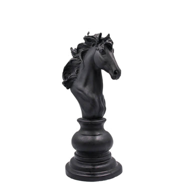 Black horse head candle on a white background