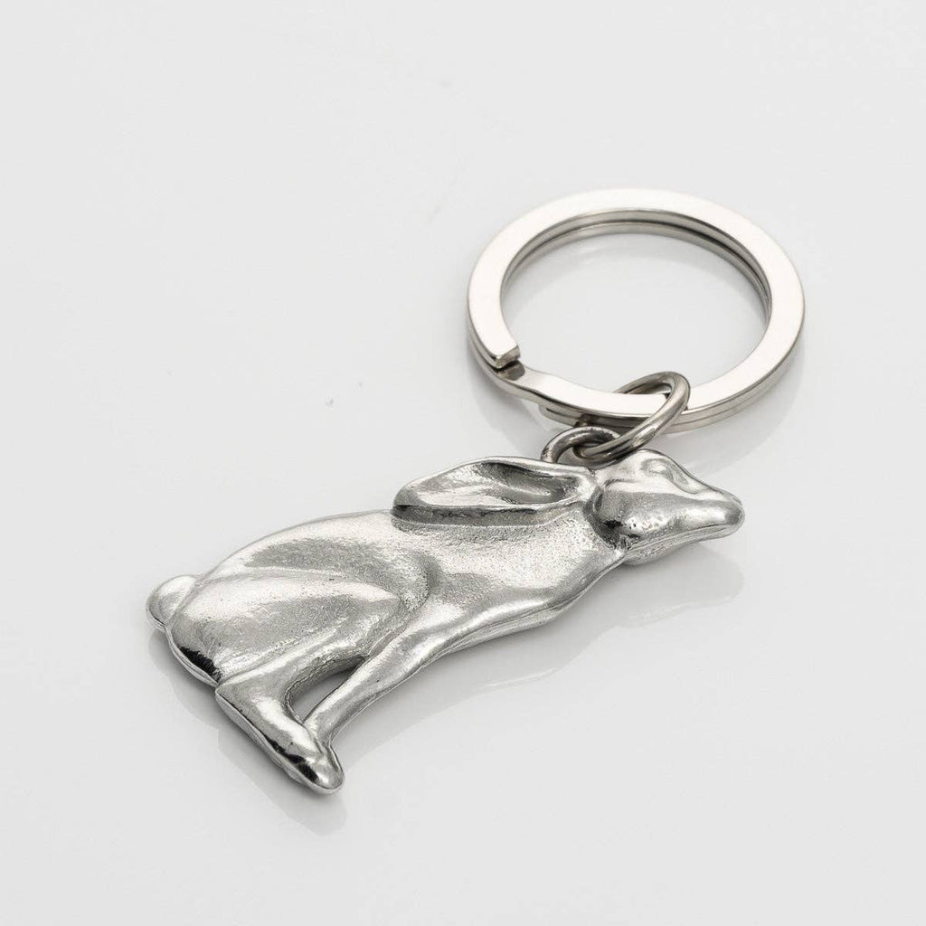 Pewter hare-shaped keychain on a light gray background
