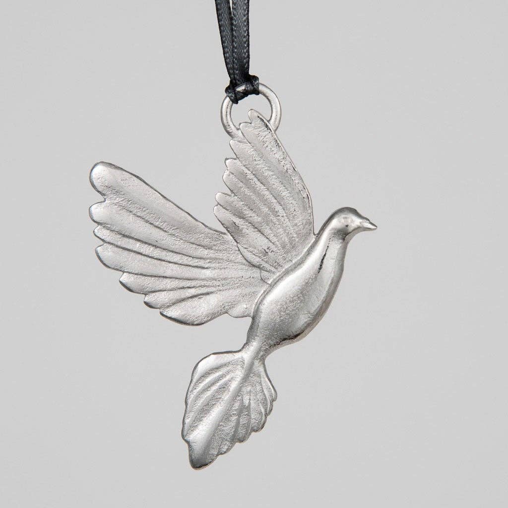 Pewter dove pendant on a gray background