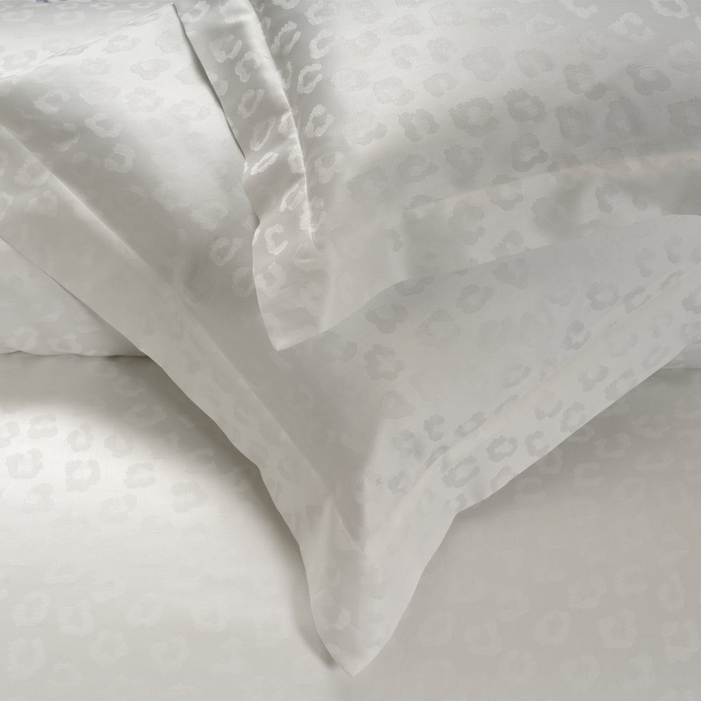 Close-up of white textured Shams 