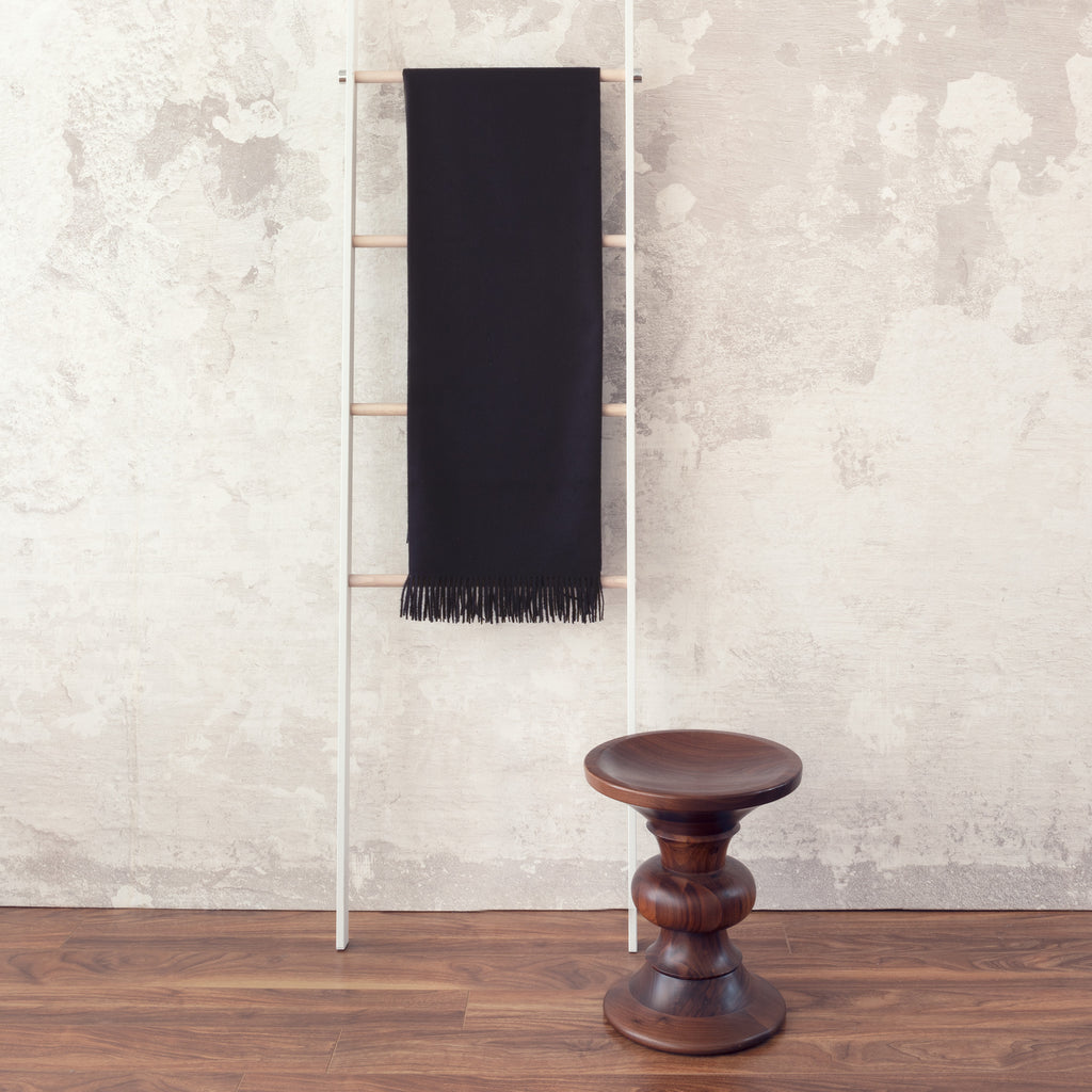 Alfie Midnight Throw draped over ladder