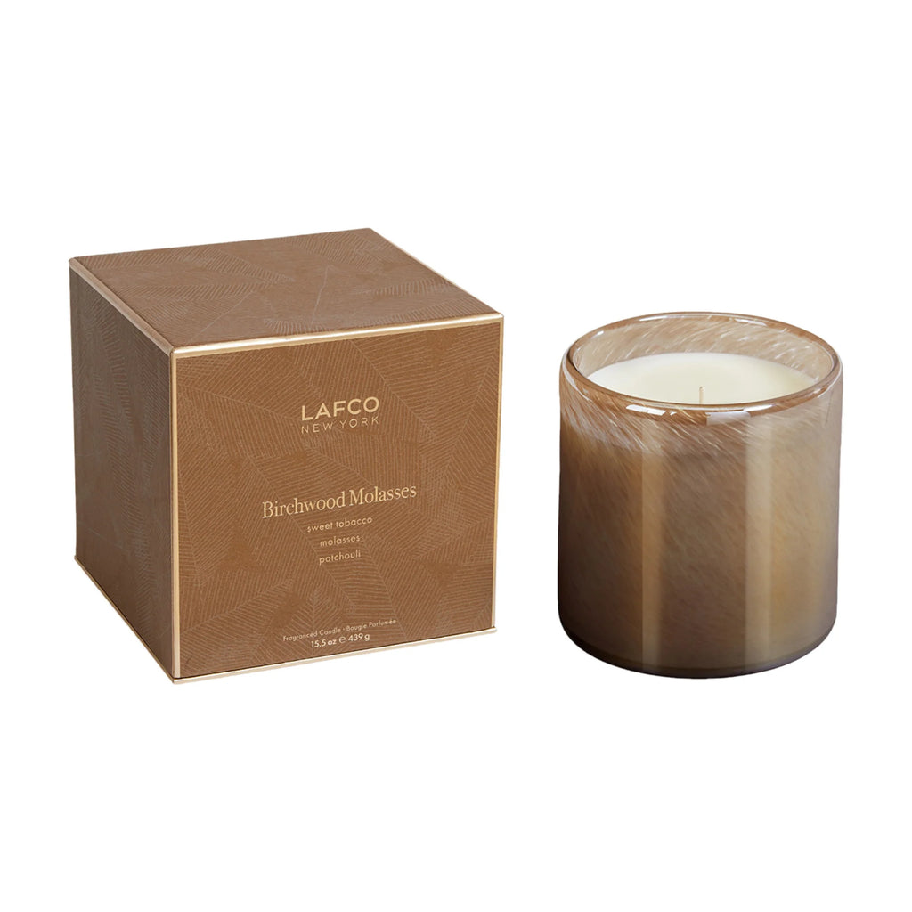 Birchwood Molasses candle shown on right side of package