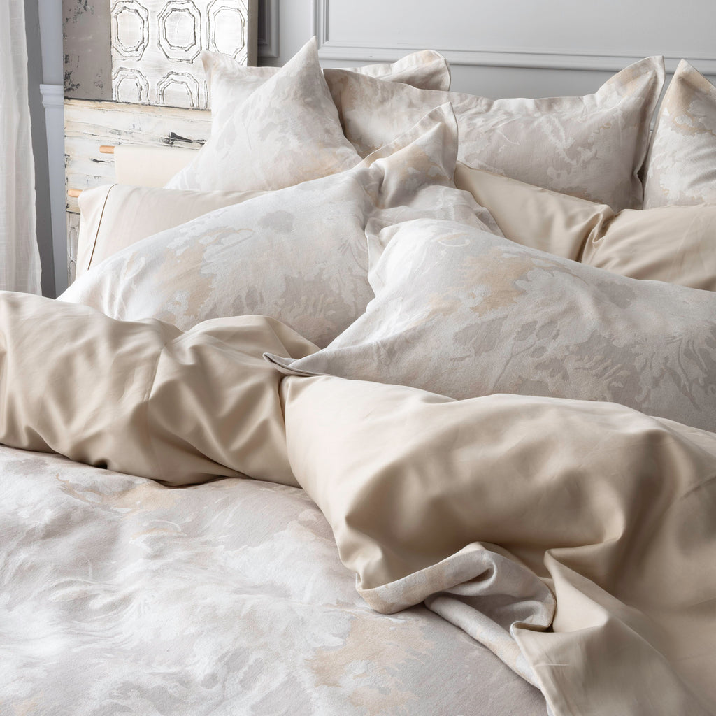Blossom Parchment bedidng diplay with duvet cover, shams. Capri Sand pillowcases. 