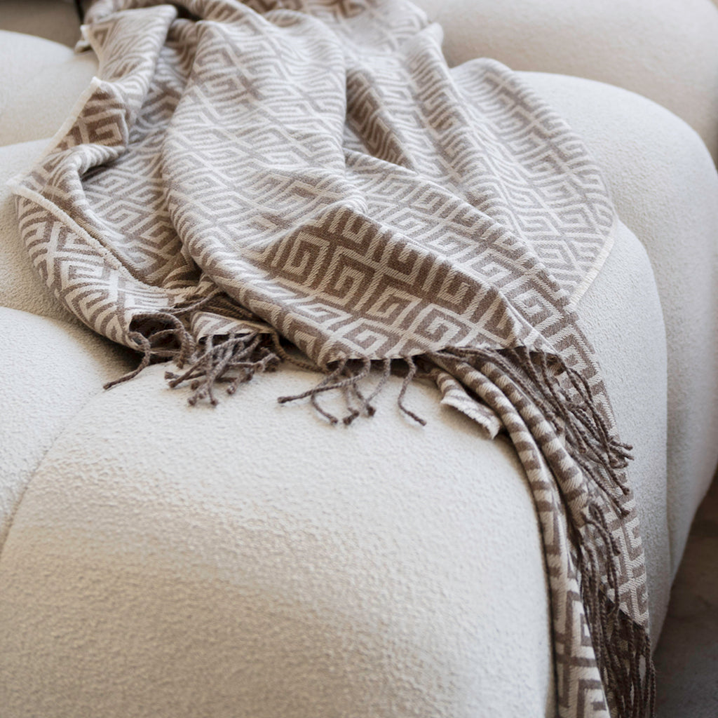 Bruno Almond Throw on the couch. Subtle elegance, works great with beige interior settings.
