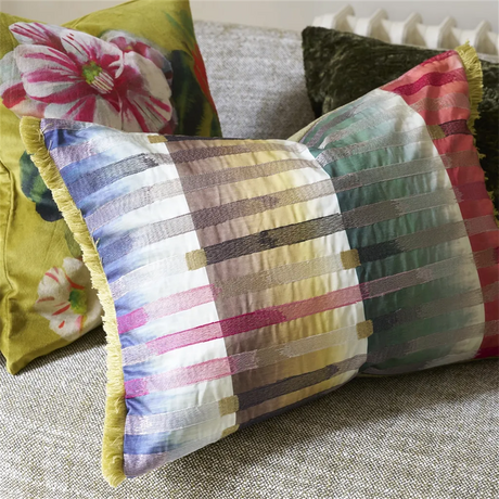 Colourful patterned pillow set on a sofa 