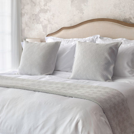 Textured diamante patterned bedding set up on the bed