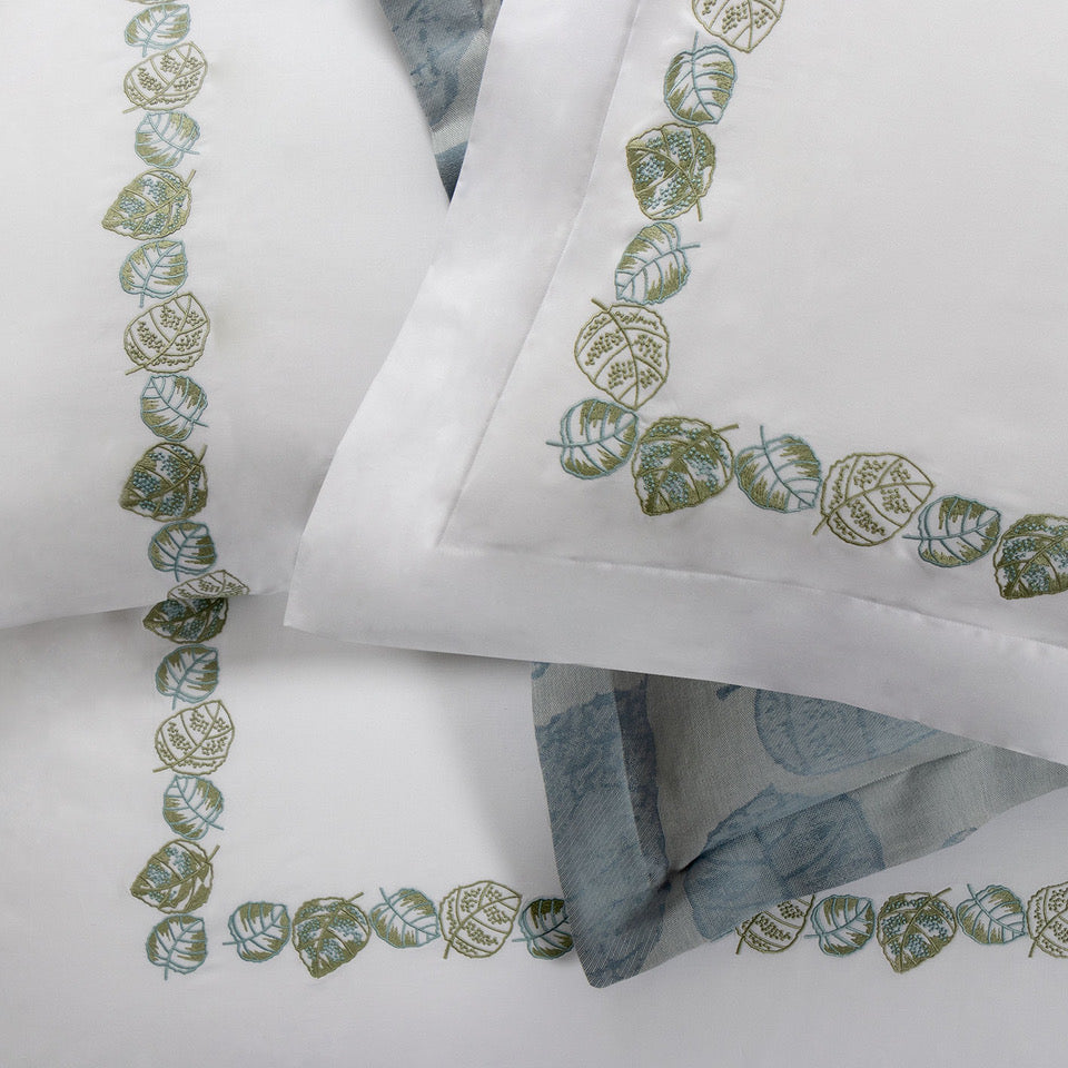 Close up of Feuillage Embroidery in White/ Sage Green  on Sham 
