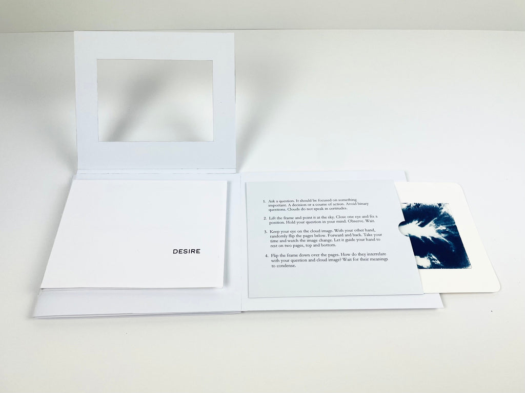 Open book with text and a small image on a white background