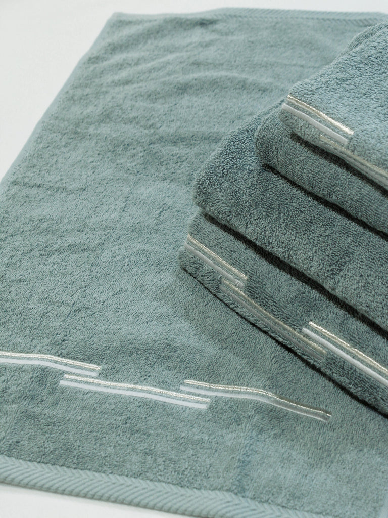 Aqua Tuscan towels with Silver embroidery detail.