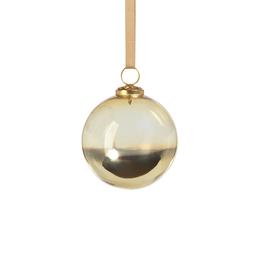 Ombre Luster Ornament hanging on a gold ribbon 