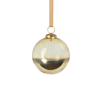 Ombre Luster Ornament hanging on a gold ribbon 