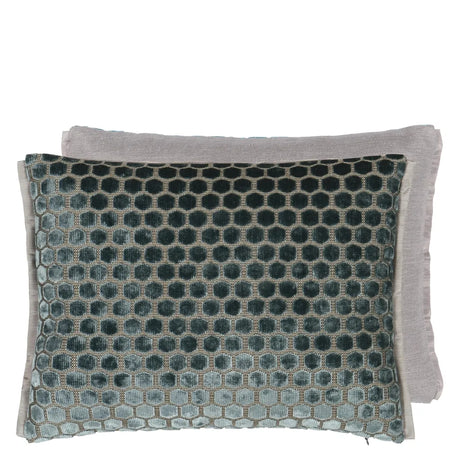 Textured velvet pillow with geometric pattern on a white background