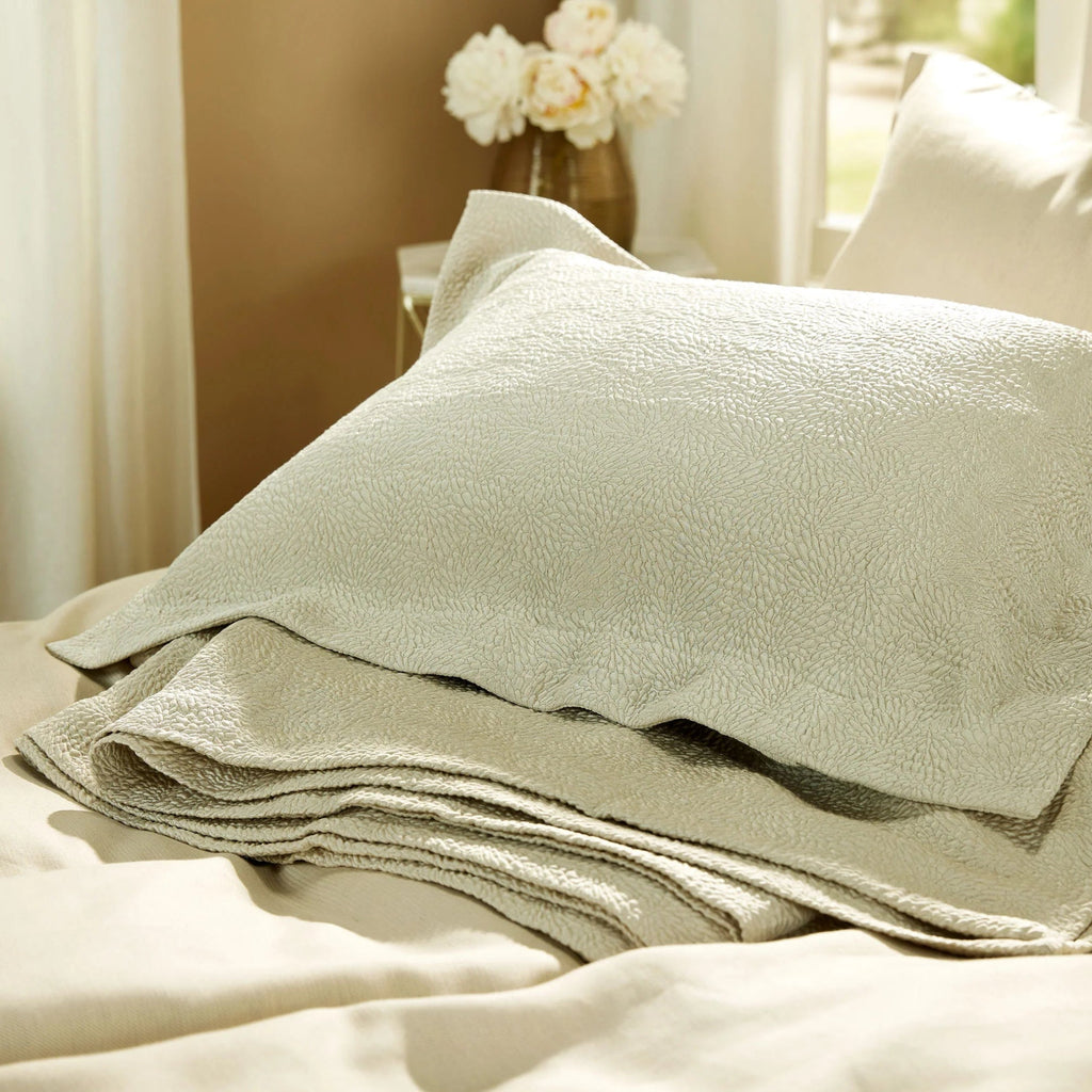 Jazz Platinum Sham with a coverlet on the bed 