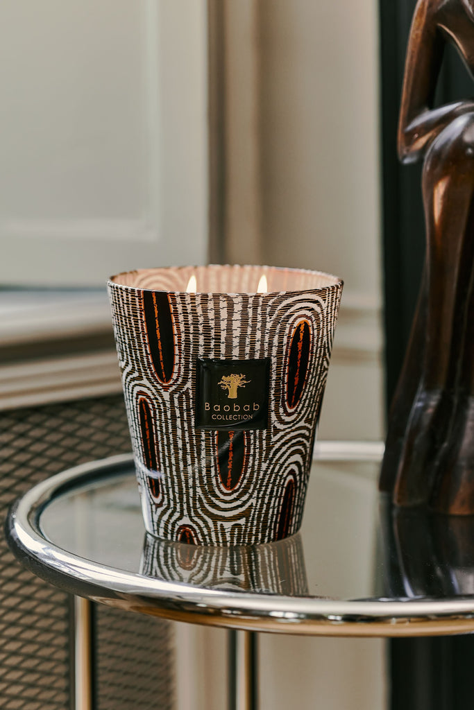 Baobab Maxi Wax Panya Max 16 Candle shown on glass topped side table