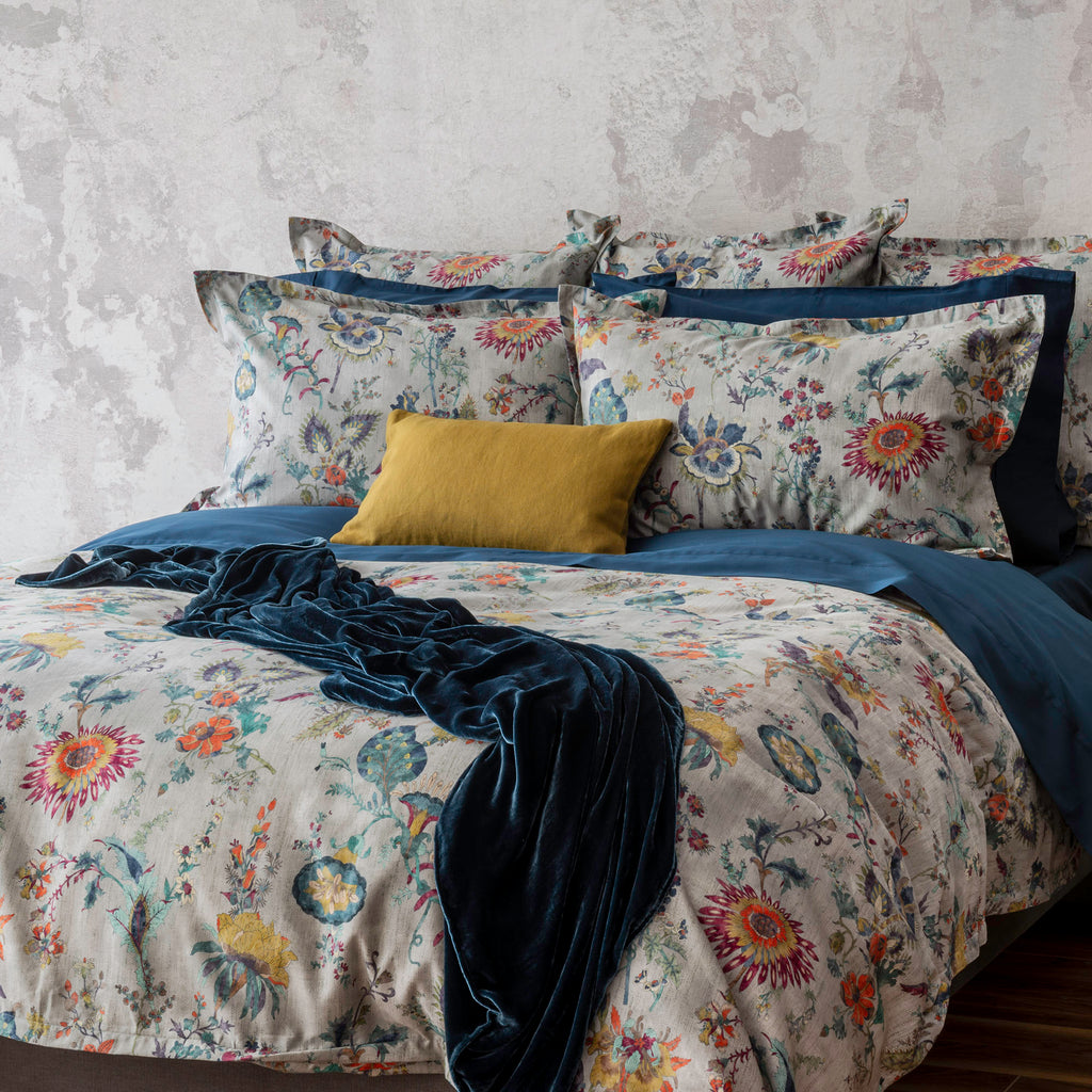 Morgan printed sateen bedding look. Paired with capri sheet and pillowcase, and decorated with Forma cushion and Divina throw