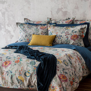 Morgan printed sateen bedding look. Paired with capri sheet and pillowcase, and decorated with Forma cushion and Divina throw