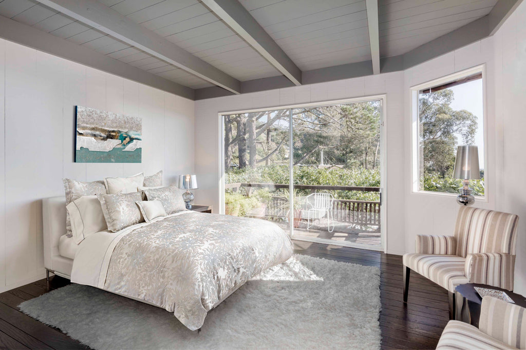 Noto Beige/ Wilton Blue bedding on bed in modern styled bedroom