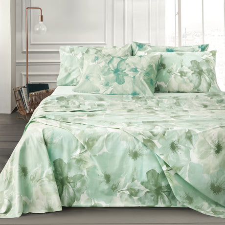 Flowers-patterned bedding in light green and blue tones.