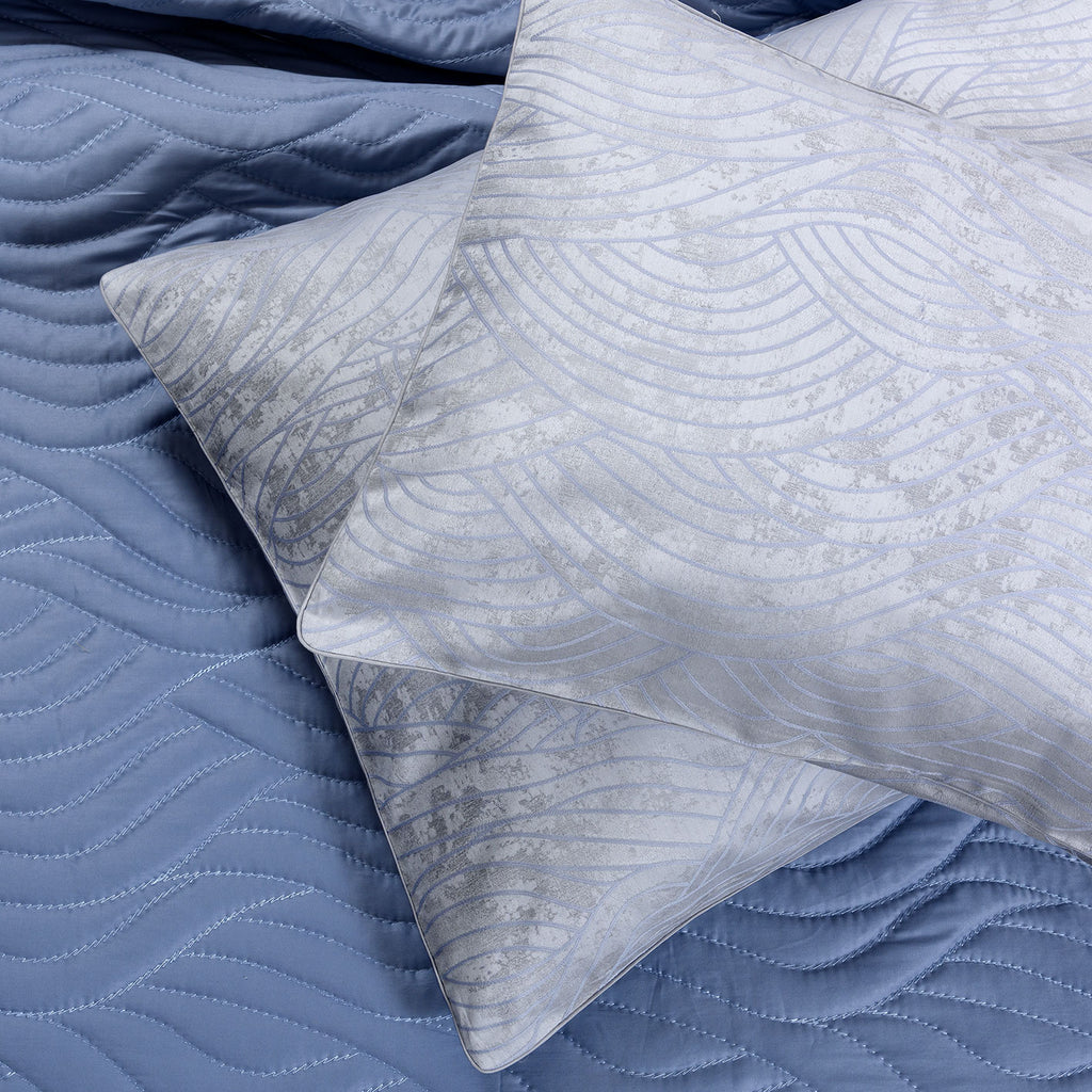 Dea Jacquard Pelago pillow on Pelago quilted coverlet