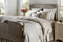 Patterned bedding and pillows in Oregano colour