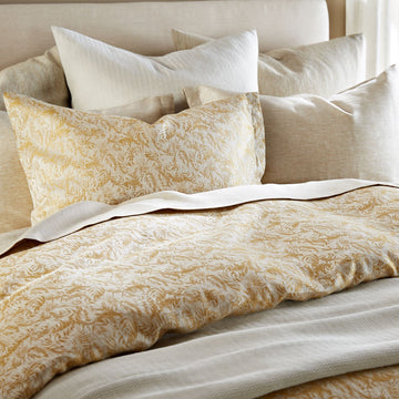 York Dijon duvet cover and shams shown with coordinating bedding