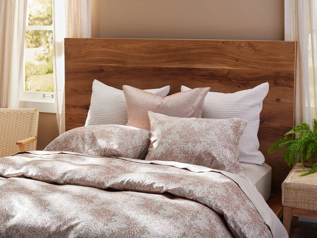 Patterned bedding and pillows in Rust colour 