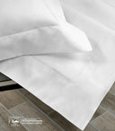 Sea Island with Punto Parigi seem in white 