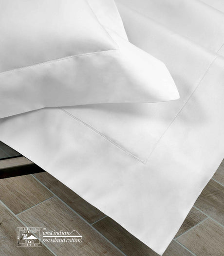 Sea Island with Punto Parigi seem in white 