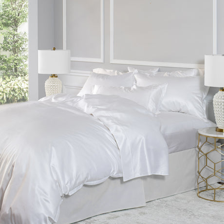 White silk/cotton bedding set up on the bed 