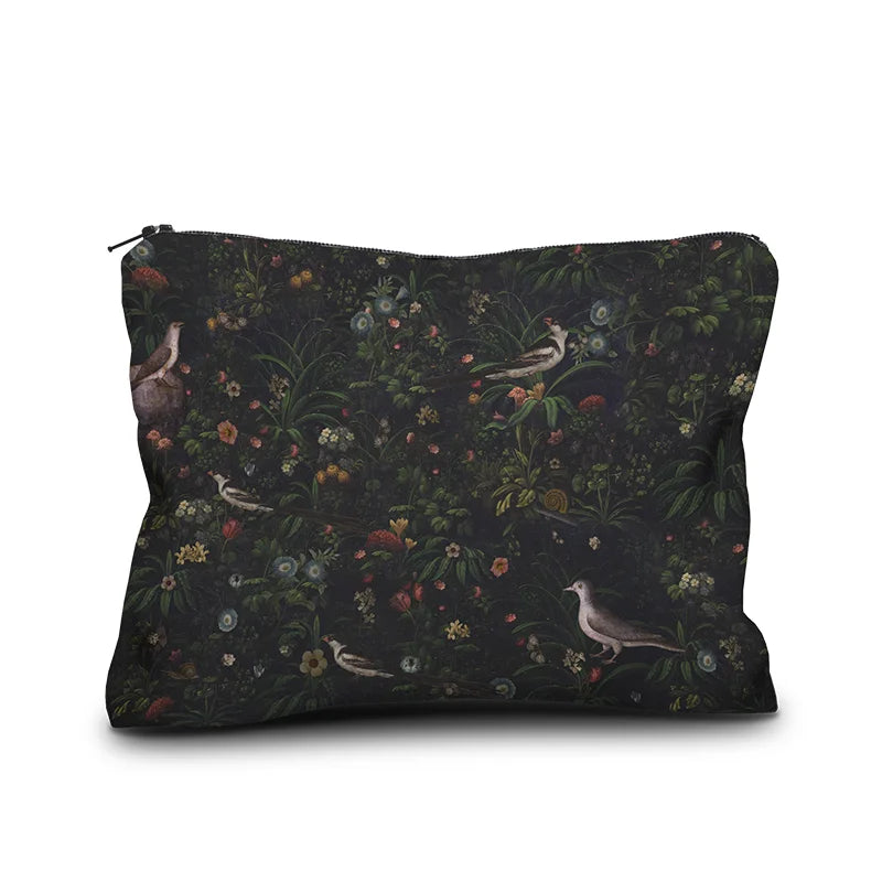 Reverse of velvet accessory case with classical painting of small birds and flowers.