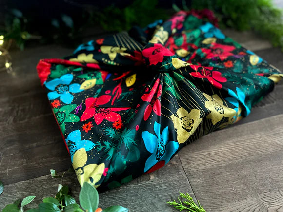 Sustainable and reusable cotton gift wrap with a timeless patterned design