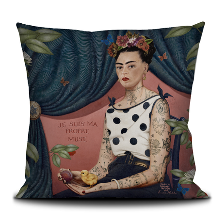 Decorative pillow with a portrait of a tattooed woman and floral decorations.