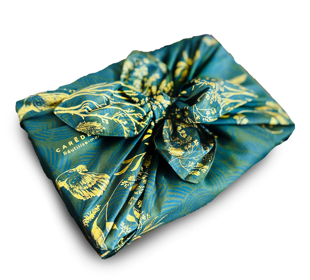 Sustainable and reusable cotton gift wrap with a timeless patterned design