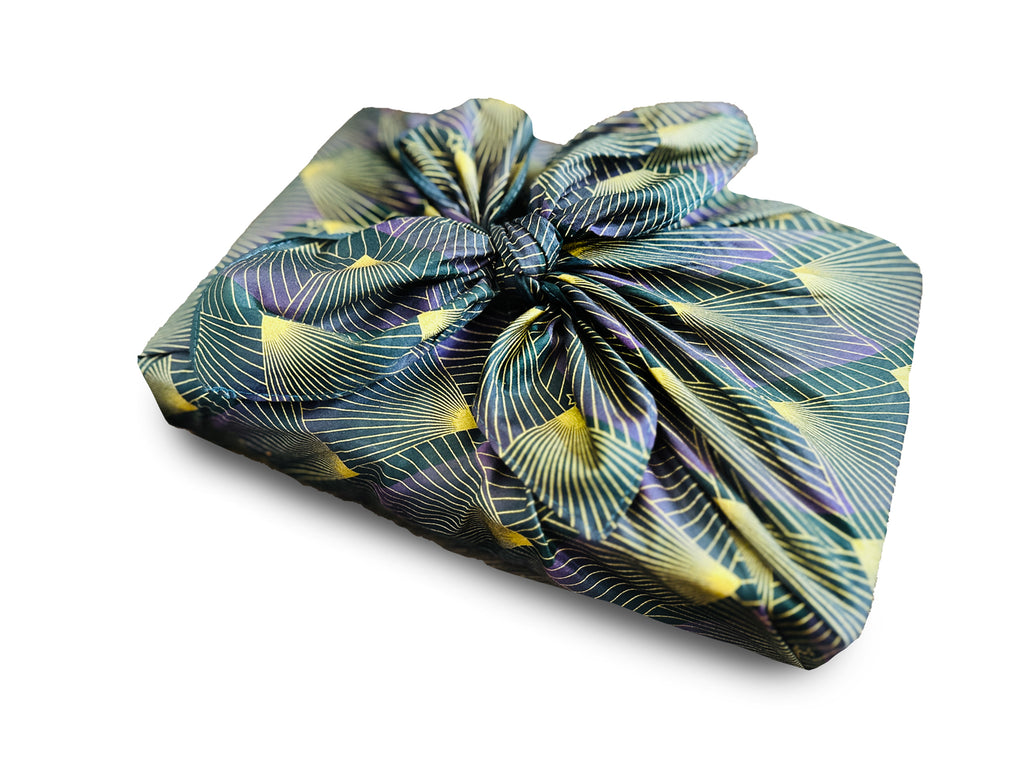 Sustainable and reusable cotton gift wrap with a timeless patterned design