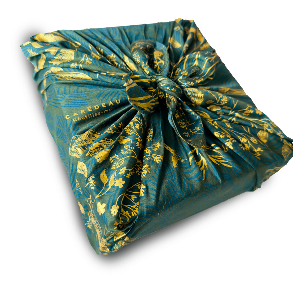 Sustainable and reusable cotton gift wrap with a timeless patterned design