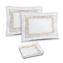 Feuillage Embroidery in White / Ivory shown on two shams and duvet cover