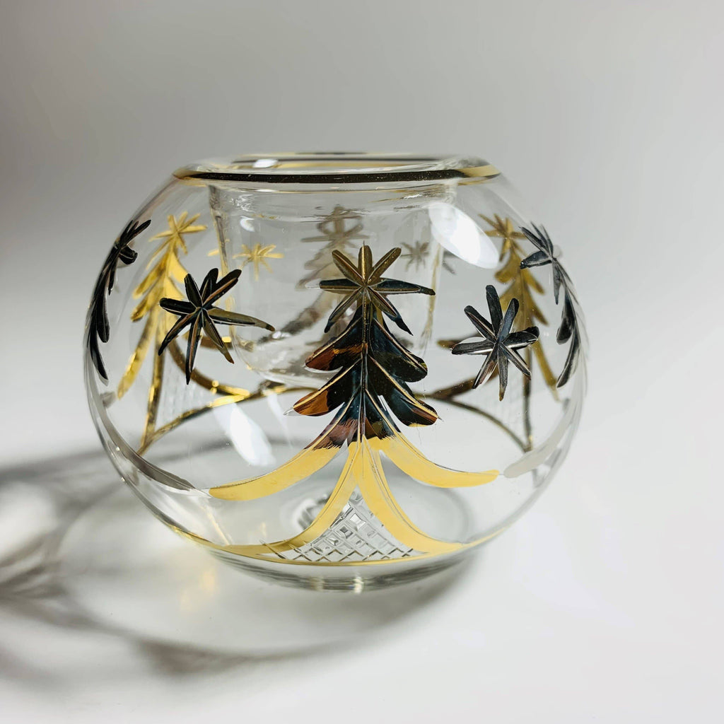 Decorative clear glass candle holder with gold tree designs 