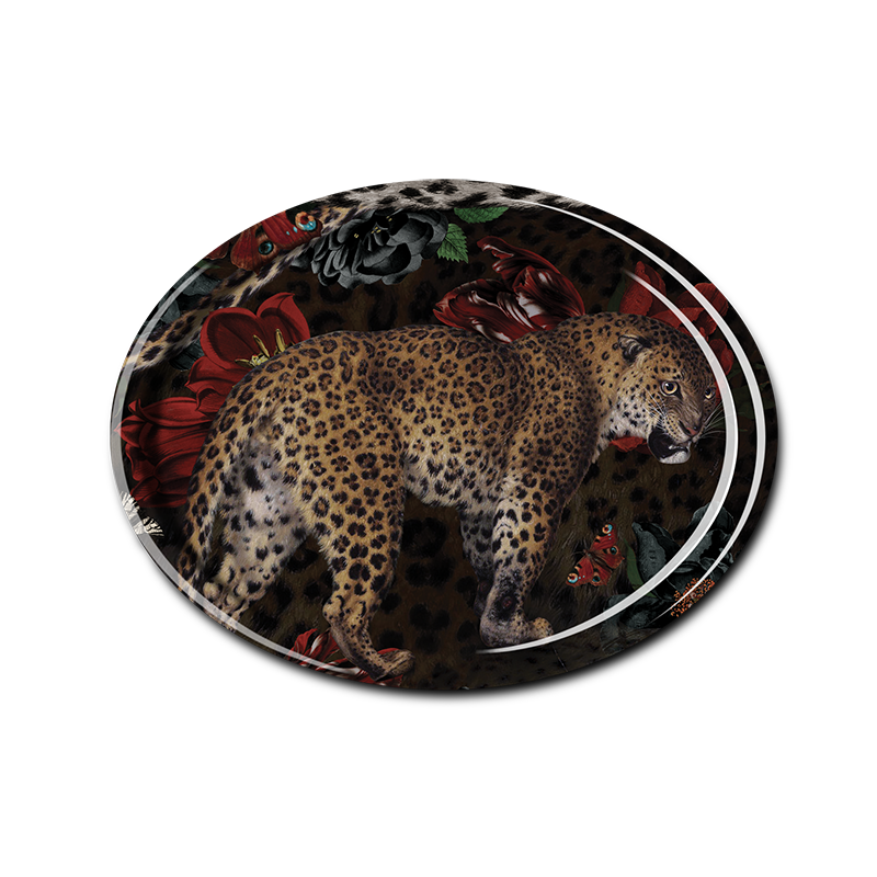 Oval tray with a leopard design on a black background