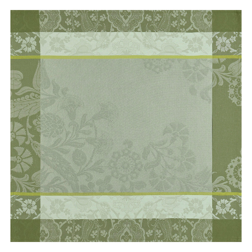 Voyage Iconique Green napkin woven with an open tone on tone pattern on the main surface and a wide border with intricate tone on tone curvilinear pattern in a deeper green.