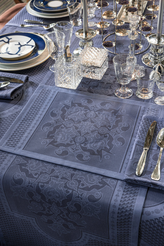Le Jacquard Francais Palais Venitien placemat, runner, and tablecloth in blue