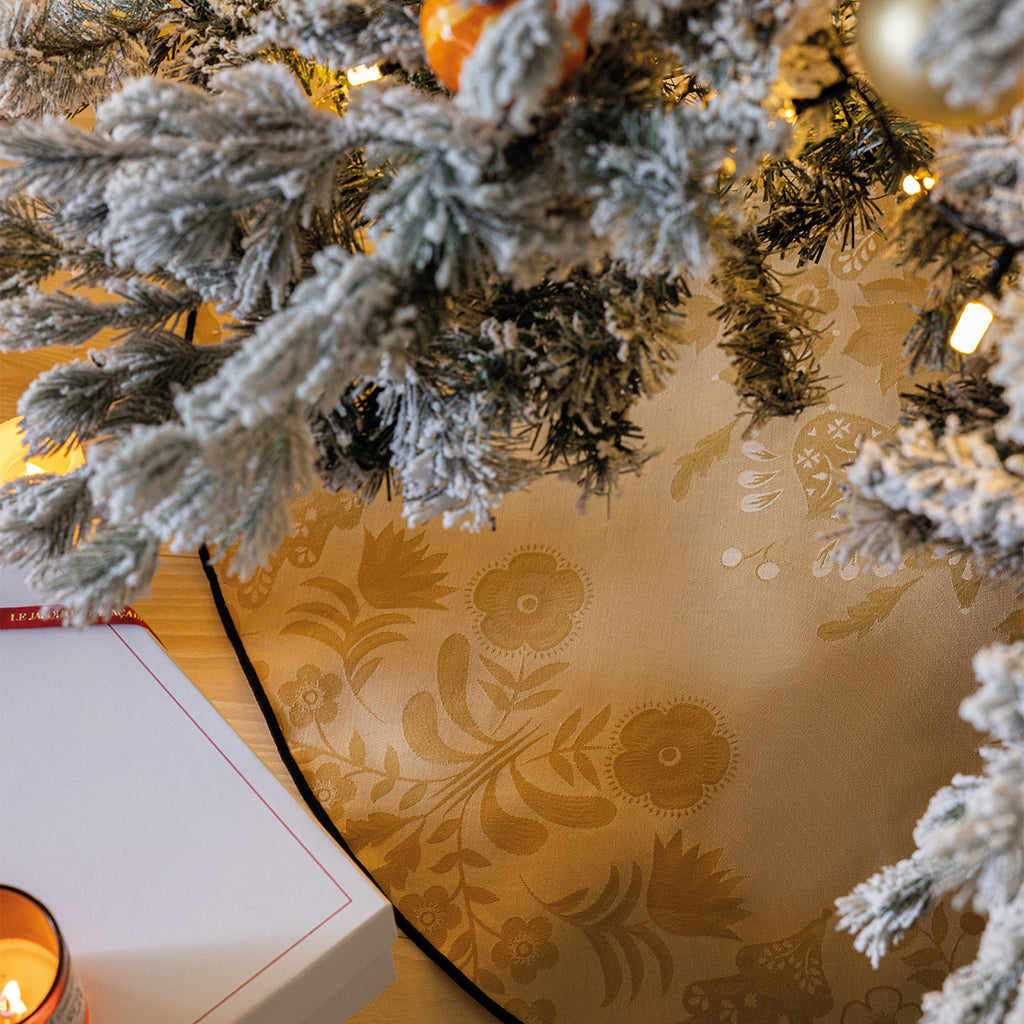 Decorative Christmas tree with French tree skirt