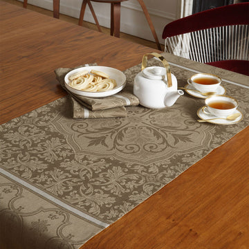 Armoiries Brown 20" x 59" Runner on a table with a tea set on top 