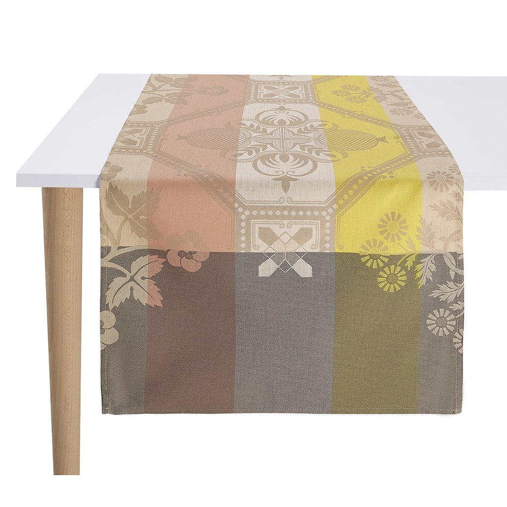 Haciaenda Beige Runner shown on a table 