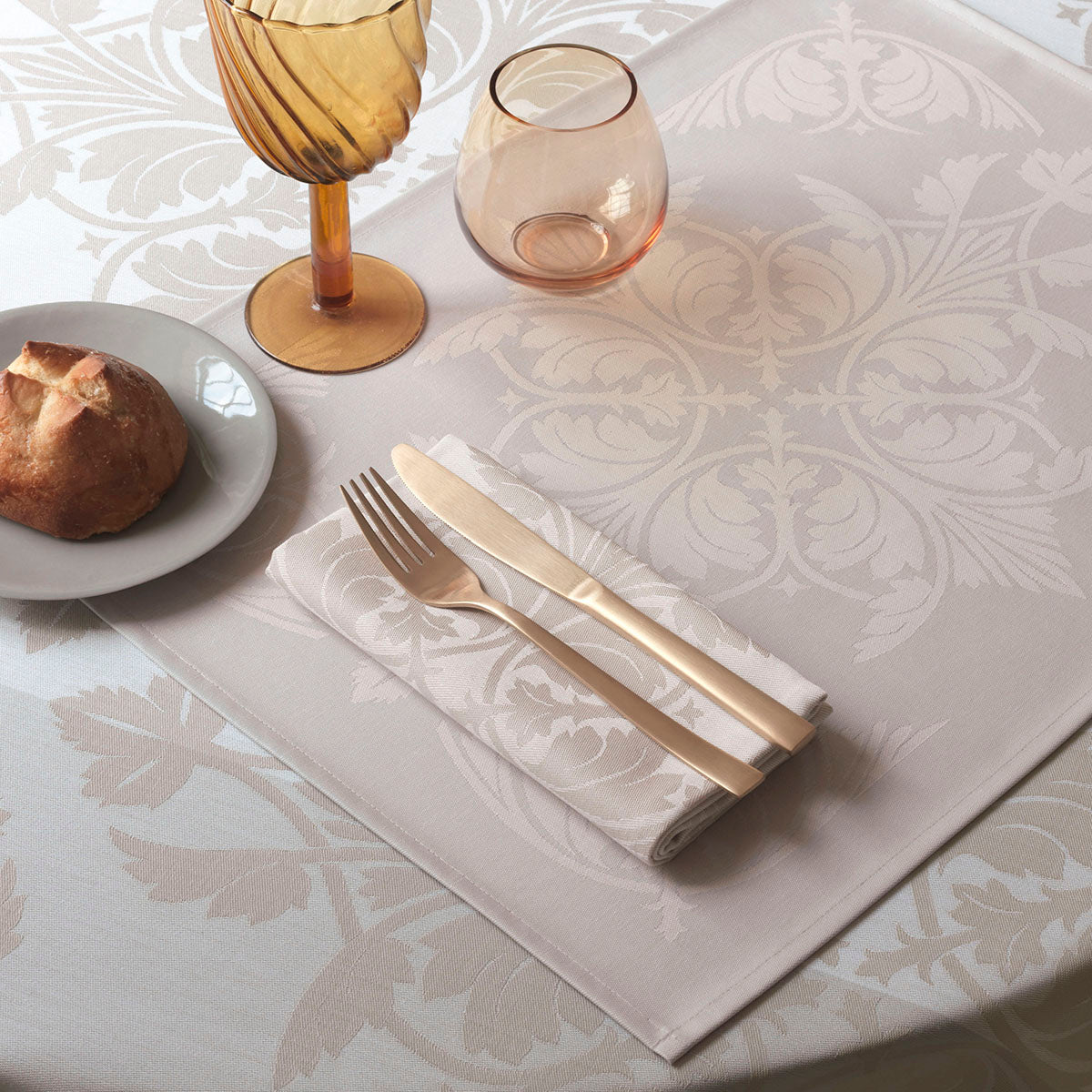 Syracuse Beige Placemats - shown with a table setting